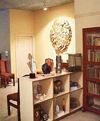 Wall sculptures adorn the living room.