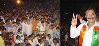 Bollywood star Suresh Oberoi addresses an election meeting in support of BJP candidate