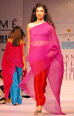 Models display fashion designer Wendell Rodricks's creations on the third day of 5th Lakme India Fashion Week