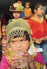 Kids in cheerful outfits at a toddlers talent and fancy dress competition, organised in Ludhiana