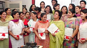 Participants are all smiles at the concluding day of teachers training workshop at Chitkara Education Trust in Chandigarh, on Friday.