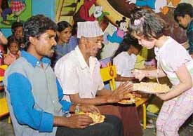 Children of Love Dale Nursery School distribute eatables among labourers to celebrate Labour Day in Ludhiana