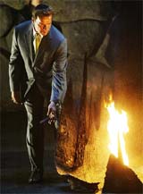 California Governor Arnold Schwarzenegger lights the Eternal Flame in the Hall of Remembrances at the Yad Vashem Holocaust Memorial in Jerusalem on Sunday