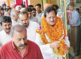 INLD candidate from Chandigarh Harmohan Dhawan campaigns in Sector 46 on Monday. 
