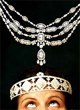 A model wears a Cartier diamond and pearl bandeau 