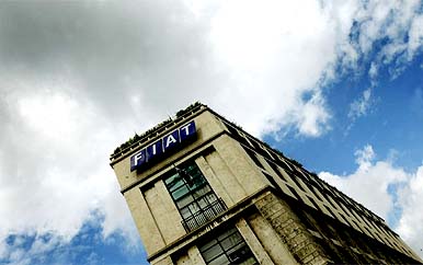 Clouds gather over Rome's Fiat headquarters during a demonstration on Tuesday