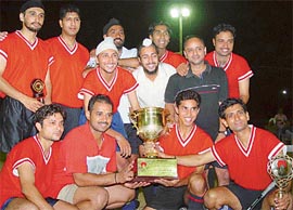 Rock Rovers team which won the Dharam Singh Memorial Hockey Tournament at the Sector 18 hockey stadium, in Chandigarh on Tuesday. 