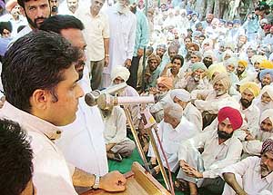 Mr Manish Tiwari, Congress candidate from Ludhiana, addresses a rally at the Koom Kalan area in the city on Wednesday. 