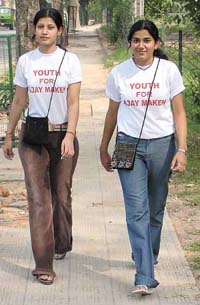 Congress candidate from New Delhi Ajay Maken garnering the support of the youth with his interesting T-Shirt gimmick.