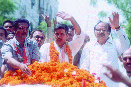 Sandeep Dikshit and A. K. Walia canvassing in the Capital.