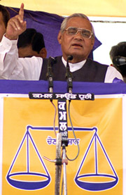 Prime Minister Atal Bihari Vajpayee addresses his party supporters during an election campaign rally in Ludhiana
