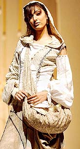 A model displays a creation of the final year students of the National Institute of Fashion Technology (NIFT) during Fashionova-2004 in New Delhi on Saturday night.