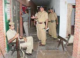 Police personnel deployed outside a polling booth in Sector 32