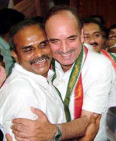 Newly elected legislative leader and Chief Minister elect Dr Y.S. Rajasekhara  Reddy is greeted by AICC General Secretary  Ghulam Nabi Azad after the party legislators meeting in Hyderabad on Wednesday. 