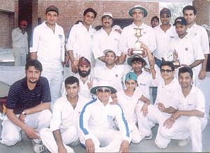 The HDFC Bank, which won the Turf Corporate Cricket Tournament, display their trophy.