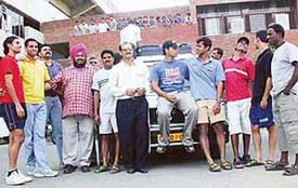 Indian hockey players on their way to Barog have a brief halt at the Sector 42 Sports Complex in Chandigarh on Thursday.
