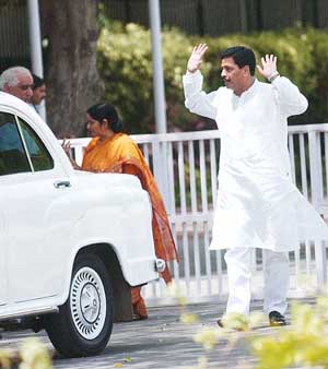 I SURRENDER: Senior BJP leader Pramod Mahajan seems to be saying this as he comes out of the residence of Prime Minister A.B. Vajpayee in New Delhi on Thursday. 