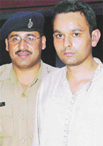 Inderpreet Singh, charged with stealing money and belongings of a Tanzanian from a hotel room, in police custody