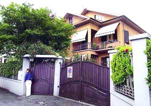 A journalist rings the doorbell of a villa in Orbassano, near Turin, northern Italy where Sonia Gandhi was born 57 years ago.