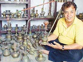 Mr Ashok Kataria holds his grandmother’s hukkah