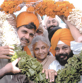 Newly elected MP Sandeep Dikshit with mother Sheila Dikshit being welcomed at a function in the Capital on Sunday. 
