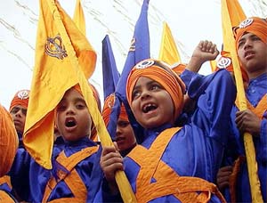 Young boys attired in traditional Nihang robes take out a procession from Golden Temple in Amritsar