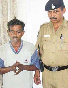 Rajesh Kumar, who murdered his two-year-old child, in police custody in Chandigarh