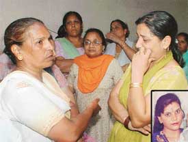 A grieving Jaswinder Kaur, mother of deceased Rimpy (inset), at Krishna Nagar 