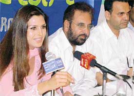 Punjabi actress Kimmi Verma makes a point during a press conference in Mohali to promote her film Asaan Nu Maan Watna Da on Thursday.
