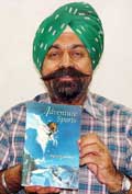 Brig T.P.S.Chowdhury shows his recently released book.