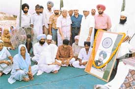 Mr D.R. Garg, SDM, Dera Bassi, at the first death anniversary of Naib Subedar Pal Singh in Devi Nagar village, near Dera Bassi