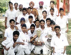Guru Harkishan Public School team with principal S S Minhas after winning the Maharaja Ranjit Singhji Under-15 Cricket Tournament