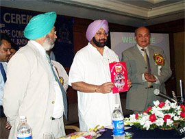 Punjab Chief Minister Amarinder Singh releases a souvenir during the 35th All-India Police Science Congress organised by the Punjab Police and the Bureau of Police Research and Development in Jalandhar on Monday.