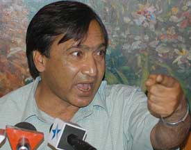 M.Y. Tarigami, state secretary of the CPM, addresses a Press conference