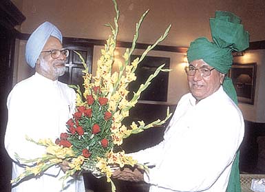 Haryana Chief Minister Om Prakash Chautala greets Prime Minister Dr Manmohan Singh in the Capital on Tuesday