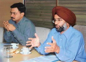 The Commissioner, Central Excise, Mr P.S. Purhoti, addresses a press conference in Ludhiana
