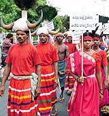 Tribals in their traditional attire during a rally