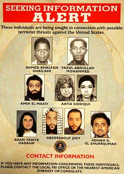 A poster of individuals sought in connection with possible terrorist threats against the USA is seen before a news conference 