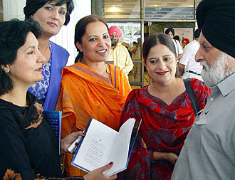 Eminent women writers from Pakistan share light moments with Dr Satinder Noor, president of the Indian chapter of the World Punjabi Conference, at Hotel Shivalik View on Saturday. 