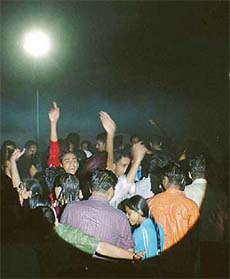 People dance in artificial rain at Magnet Resort in Ludhiana