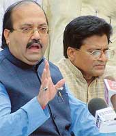 Mr Amar Singh, General Secretary of the Samajwadi Party, along with Mr Ram Gopal Yadav, Leader of the partys parliamentary group, addresses a press conference in New Delhi on Monday. 