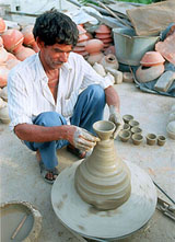 A potter gets busy following Railway Minister Laloo Prasad Yadav's announcement