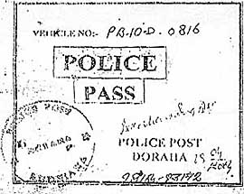 A police pass used to evade tax at a toll tax barrier on the national highway near Doraha.