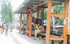 Roadside dwellers who have turned a bus stop shelter along the Ferozepore road into a home.