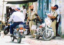 PCR cops man a strategic position near Old Courts in Ludhiana