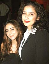 Bollywood actresses Manisha Koirala and Kim Sharma at the launch of Loewe perfume in Mumbai on Thursday evening.