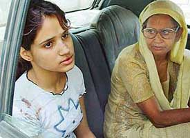 An injured Priyanka (left), who lost her father and brother in an accident on Friday night, at Kharar on Saturday
