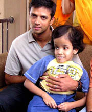 Ten-year-old Kaveri Chauhan, daughter of cricketer Kedar Chauhan, shares the company of Indian cricket team Vice-Captian Rahul Dravid