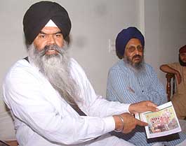 A former Akal Takht Jathedar, Bhai Ranjit Singh, and Baba Sarbjot Singh Bedi of the Panthic Morcha address a press conference in Amritsar on Monday. 
