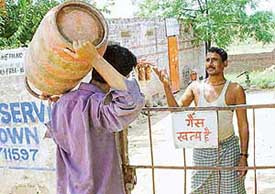 A man being turned away from a gas godown as LPG distributors in Chandigarh remained on strike on Thursday